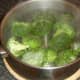 Boiling water and salt added to broccoli florets