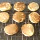 Christmas pudding pancakes are cooled on wire rack