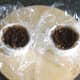 Christmas pudding is spooned in to chocolate cups