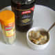 Seasoning jellied conger eel and cockles with malt vinegar and white pepper
