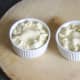 Puff pastry pies are crimped and glazed