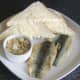 Jellied conger eel and cockles with pan fried herring fillets and bread and butter