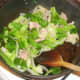 Cabbage and onion are added to lightly sauteed bacon