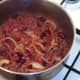 Chilli is brought to a gentle simmer