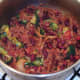 Broccoli is carefully stir folded through chilli