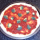 Broccoli is arranged on pizza