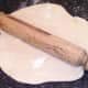 Rolling out pizza dough