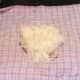 Potato grated on to tea towel