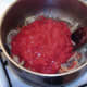 Canned tomatoes are added to beef