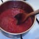 Pizza sauce dip is brought to a simmer