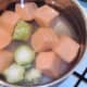 Sweet potato and broccoli stalk is put on to boil
