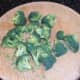 Broccoli is carefully cut in to small florets