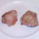 Roasted chicken thighs are left to rest and cool