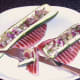 Enjoying pineapple salsa stuffed zucchini boats with gammon steaks
