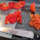 Chopping the capsicum and tomato.