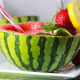 A mini seedless watermelon is ideal for serving individual drinks. Add a straw, and you're good to go.