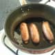 Frying chilli sausages