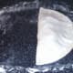 Empty pastry half is folded over filling