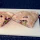 Pasty is cut in half for service