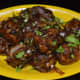 Mix the fried vegetable balls with gravy (made as per instructions) to get delicious Veg Manchurian.