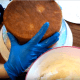 Add the second layer, top-side down and bottom side up. You will have a perfectly flat top every single time this way.