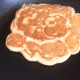 After the pancake is flipped, allow it to cook on the other side for a few minutes. If you want to make sure that the center is done, insert a toothpick or a butter knife into the center. If it comes out clean, your pancake is done!