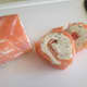 When sliced, you can see the nice pinwheel design that you created in the salmon roll.