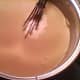 Whisking cheeses until smooth