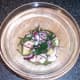 Samphire, king prawn and pineapple salad is ready for plating