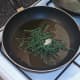 Samphire is sauteed in olive oil with garlic and pepper