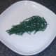 Samphire is arranged as a bed for cod