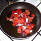 Tomatoes and red onion are lightly sauteed in oil