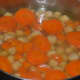 Boil the chickpeas and carrots.
