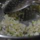 Sauteing onion, ginger, green chlili, and garlic