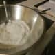 Combine flour, baking powder, 2 tablespoons sugar, and salt.