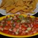 Fresh tomato-red onion salsa with home made nacho chips