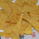 Step six: Fry the triangles in oil. When they are crispy, transfer them to an absorbent paper towel.