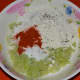 Mixing together the kofta dough.