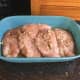 First, marinate the chicken. Rub in salt and pepper into the chicken. Combine 3/4 cup of the lemon juice, olive oil, 3 cloves garlic, 8 sprigs tarragon, and some salt and pepper additional into a casserole dish or some other shallow vessel.
