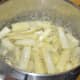 Pre-cook the baby corn in salt water for 5 minutes.