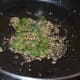 Step seven: Prepare tempering. Heat oil and add mustard seeds, sesame seeds, hing, and curry leaves. Let the mustard crackle.
