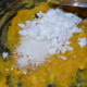 Step five: Add sugar, grated coconut, cardamom powder, and salt. Mix well.