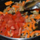 Step four: Throw chopped tomatoes into the pan. Stir-cook till they are soft, not mushy.