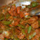 Step 5: Add par-boiled veggies. Continue stir-cooking on low heat for 2 minutes.
