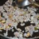 Step three: Add chopped onion. Continue sauteing till onion turns transparent.