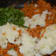 Step six: Add mashed potatoes and chopped coriander leaves. Mix well.