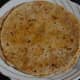Step twelve: Cook the parathas.