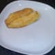 Tilapia fillet is laid on serving plate