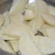 Step 6: Cut each dumpling in half.
