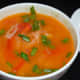 Step nine: Pour it equally into 4 bowls. Garnish with a few chopped spring onion greens or coriander leaves.